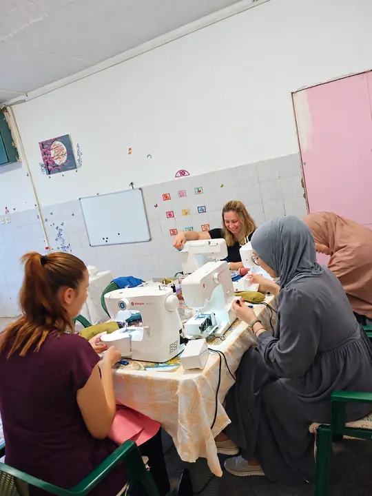 Women working together at sewing machines